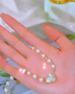 Soraya 18K Gold-Plated Necklace – Magnetic Heart with Elegant Pearl Detail - Image 6