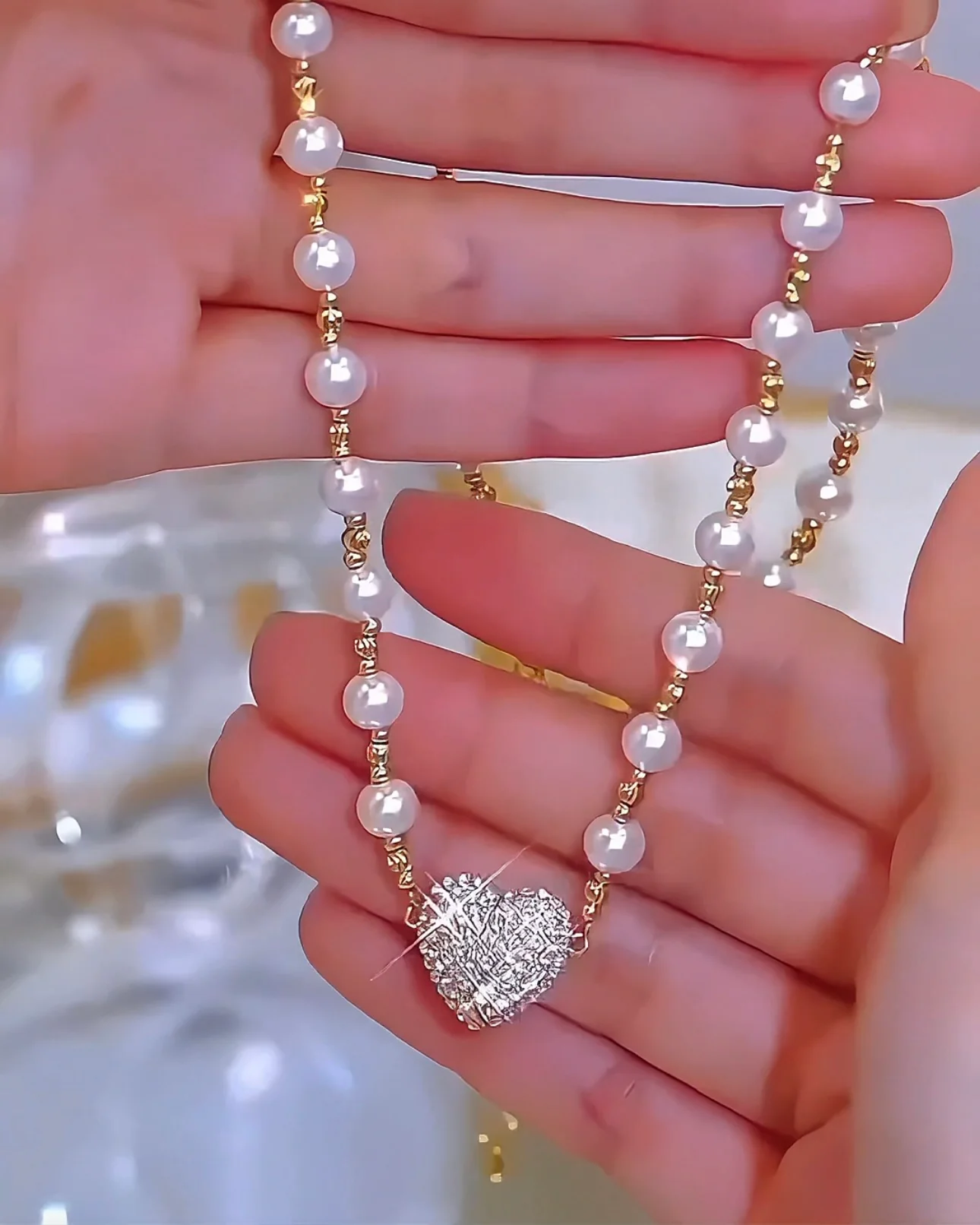 AEE48042-3FE1-41E6-9B7F-991EC2B7F263 Soraya 18K Gold-Plated Necklace – Magnetic Heart with Elegant Pearl Detail - Image 1